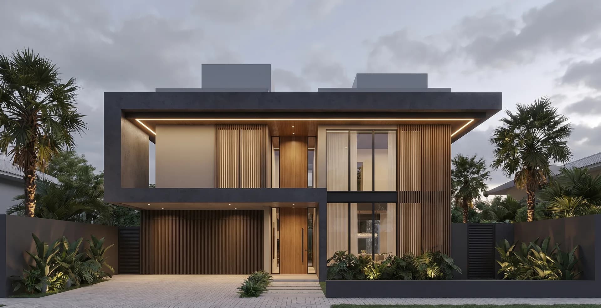 Two-storey villa at dusk with a dark cantilevered upper floor, oak slat screens, a timber front door and palms either side